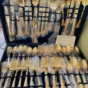 62 original gold wm rogers and son silverware set